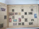 an open book with a lot of stamps on it