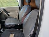 a small van with two seats in the back of it
