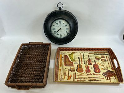 two trays and a clock on the table