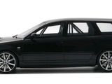the black car is parked on a white surface with a white background