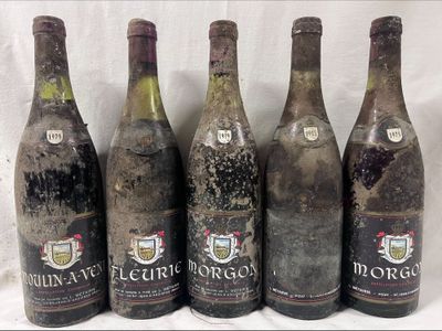 six bottles of wine are lined up in a row on a table