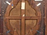 a picture of an old wooden door with stickers on it