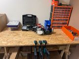 a workbench with tools on it in a room
