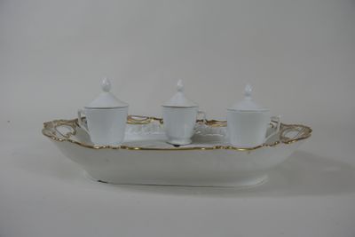 a small tray with a tea set on it