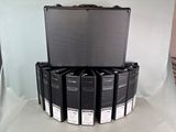 a lot of black binders stacked on top of each other