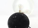 an image of a light bulb and a black object