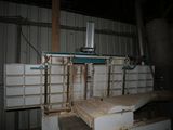 an image of a machine that is working on a piece of wood