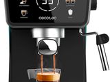 a close up of a coffee machine with a cup of coffee