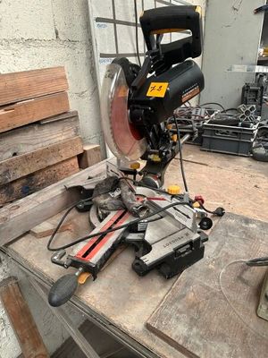 a picture of a workbench with a mitre saw on it