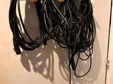 a bunch of wires hanging on the wall next to a door