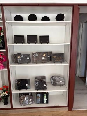 many different types of items on the shelves in this room