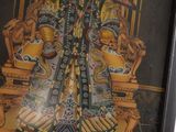 a picture of a painting of a woman sitting on a throne