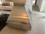 an image of a living room with a couch and a coffee table