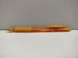 an orange pen sitting on top of a white box on a table