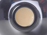 a close up of a bottle of wine with a lot of liquid in it
