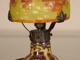 a lamp that is sitting on a glass table