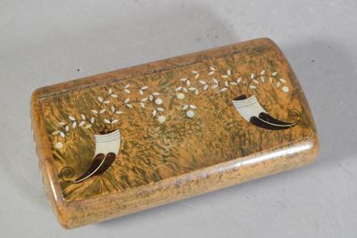 a small box with a design on it on a table