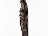 a statue of a woman with a veil on her head