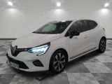 the white car is parked on a checkered tile floor