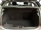 a trunk of a car with the back seats folded down