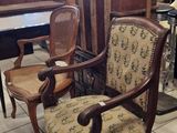 a chair that is sitting in the middle of a room