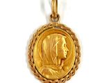 an image of a gold coin with a woman ' s face on it