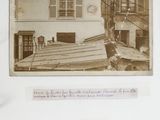 an old photo of a house with a roof that has been torn off