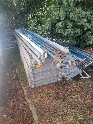 a pile of metal and wood on the ground