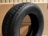tires are stacked on top of a cardboard box in a warehouse