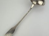 silver spoon with a spoon handle on a white surface