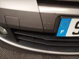 a close up of a number plate on the front of a car