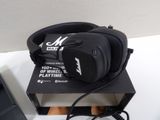 a pair of headphones sitting on top of a book