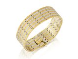 un bracelet en or orné de deux rangées de diamants blancs et jaunes