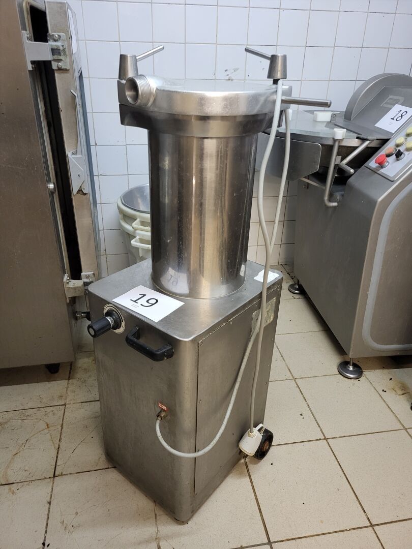 Poussoir à saucisses sans marque ni modèle apparents, tripha…