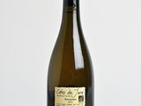 a bottle of wine that is sitting on a table