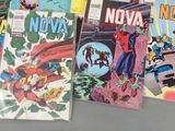 a lot of comic books that are on the table