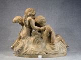 a statue of two cherenshes on a cloud