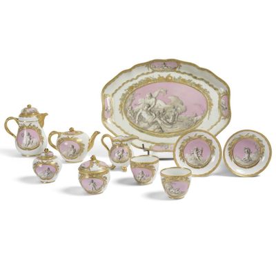 un ensemble d'assiettes, de tasses et de soucoupes en porcelaine rose et blanche