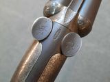 an image of a close up of a gun on a table