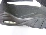 a close up of a pair of shoes on a white surface
