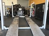 a large metal ramp in the middle of a garage