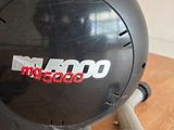 an image of a close up of a black object on a wooden floor