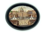 clock with a picture of a building in the middle of it