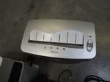 a toaster that is sitting on the floor next to a toaster
