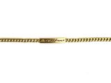 une image représentant un bracelet en or muni d'un fermoir, sur fond blanc