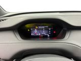 a digital display in the center of a car
