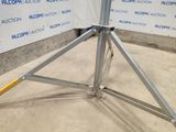 an image of a metal stand with a sign on it