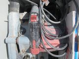 a small machine that is inside of a box