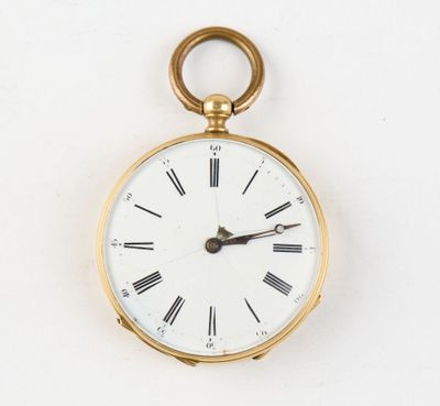 a gold pocket watch with roman numerals on the face