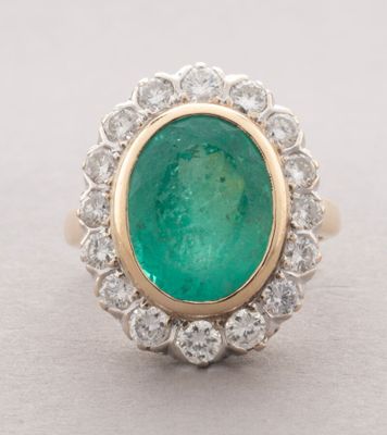 an emerald and diamond ring